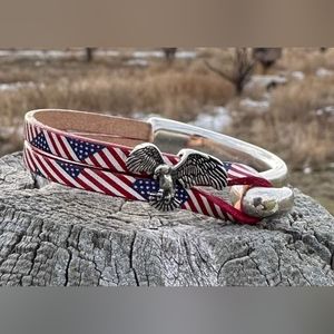 BRAND NEW!!Patriotic leather bracelet w/ cuff closure. Fits wrist size 7 inches.